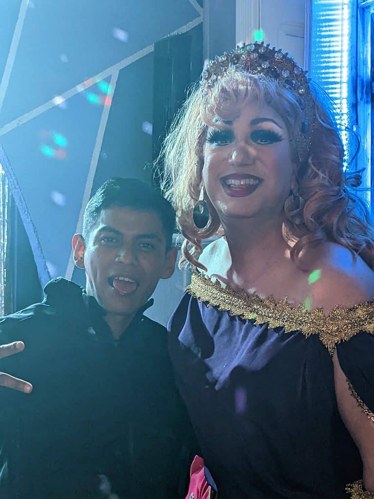 Photo of a drag queen and a fan in Punto y Apart. A gay cabaret in Mexico City's Zona Rosa.